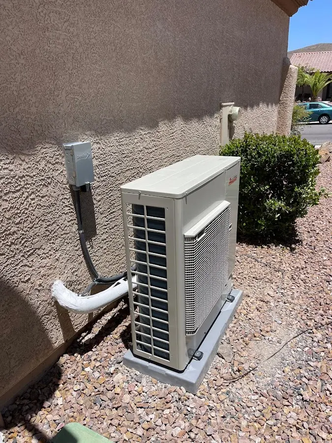 Residential air conditioning condenser unit in Hugo